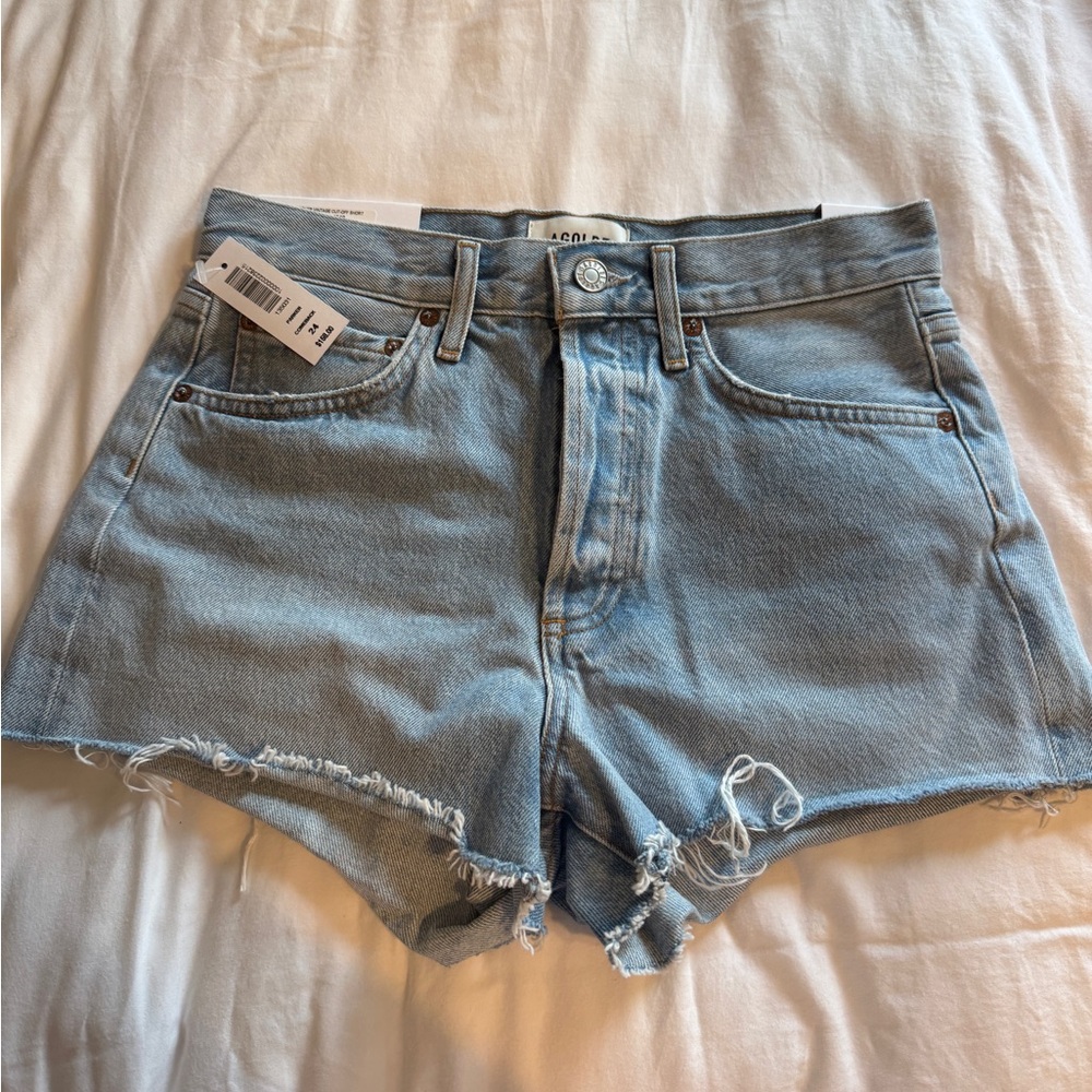 Agolde light blue denim cutoff shorts